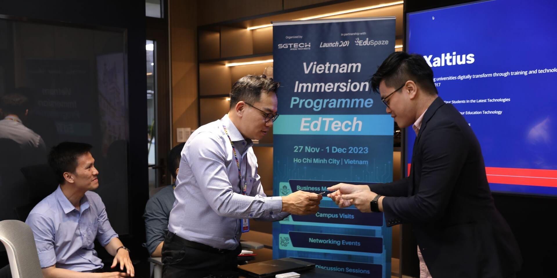UMT exchanging name cards with Xaltius (Photo: JDI)