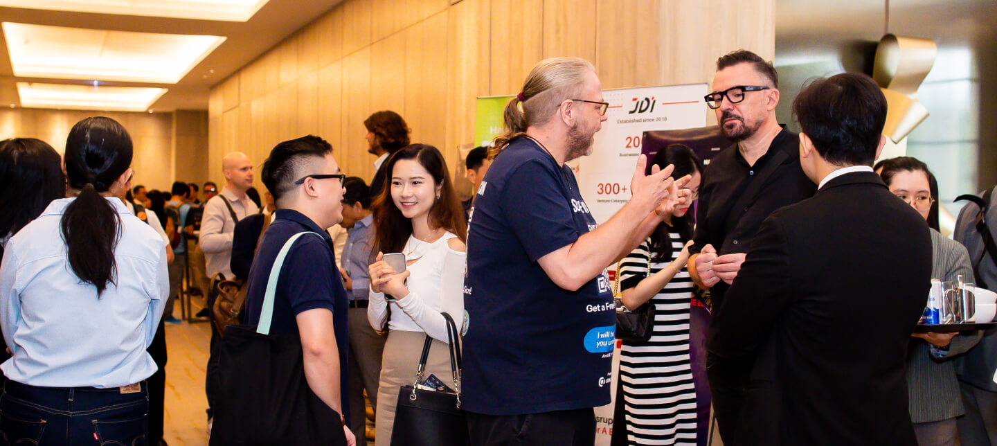 Attendees discussing with each other. (Photo: JDI)